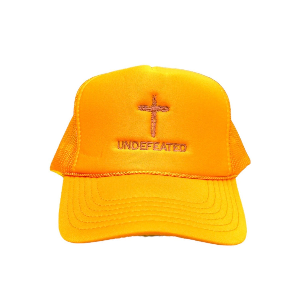 Orange Trucker Hat with rose gold undefeated cross